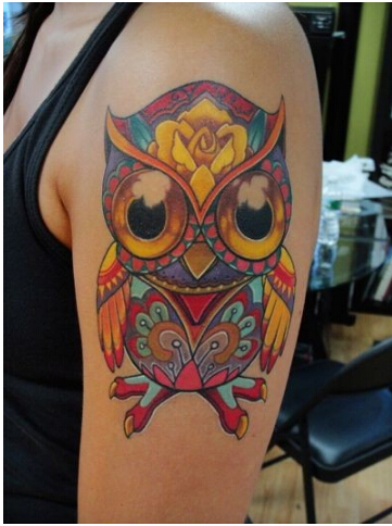 手臂上漂亮可爱好看的大雁猫头鹰纹身图片