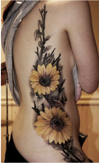 性感女人腰部漂亮好看的向日葵纹身图图片