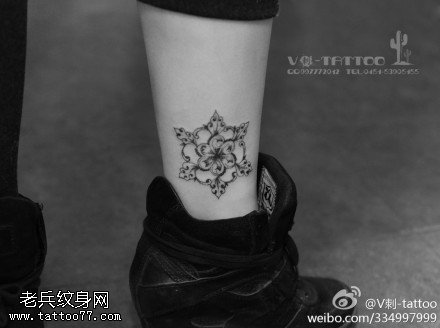 抽象晶莹雪花纹身图案