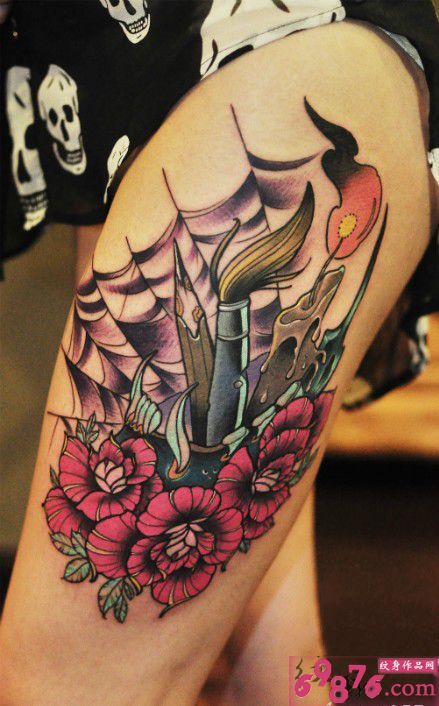 美女大腿霸气花与炮火纹身图片