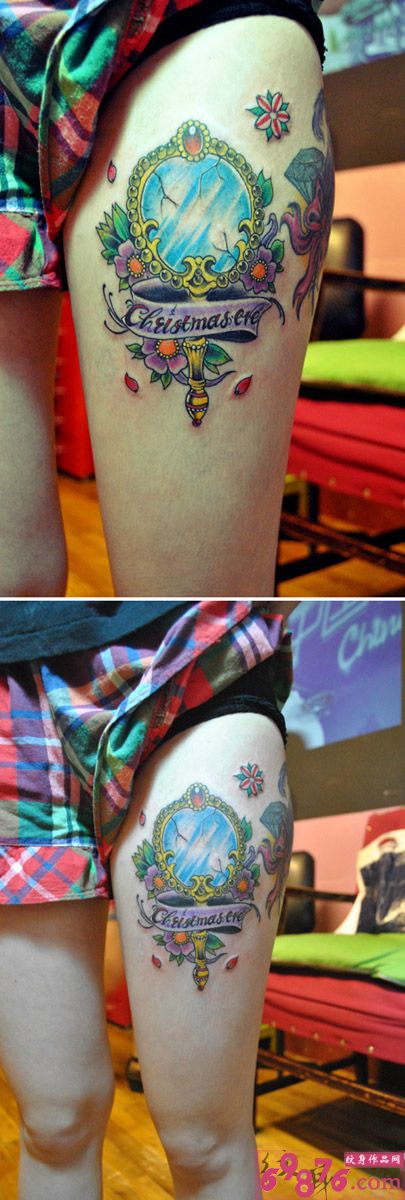 创意欧美风镜子与花纹身图片