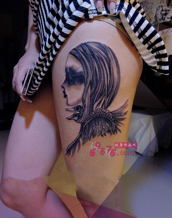 艺术风肖像大腿纹身图片