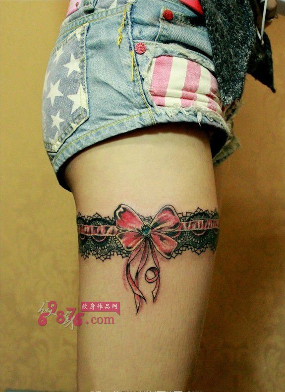 性感蕾丝蝴蝶结大腿纹身图片