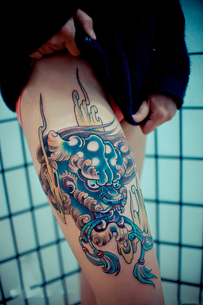 美腿复古唐狮子纹身图片