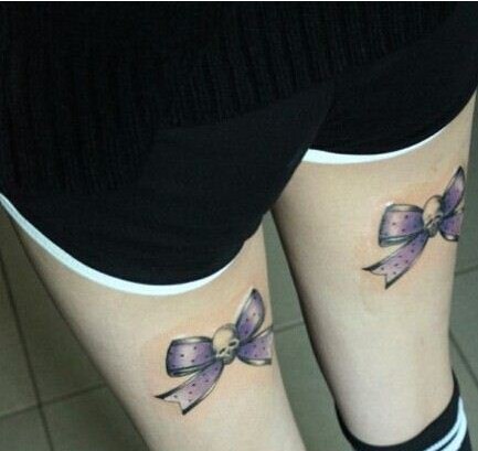女生双腿部唯美流行时尚蝴蝶纹身图案图片