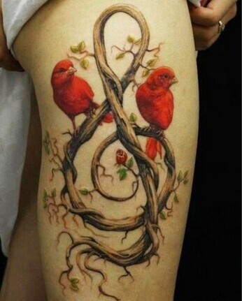 美女腿部唯美时尚树根音乐符小鸟纹身图片