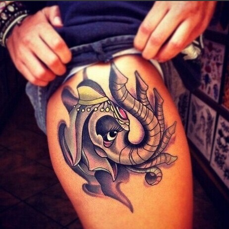 推荐一款男生腿部潮流唯美的象神纹身图片