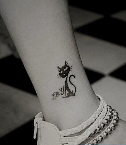 女孩腿部小猫咪纹身图案图片