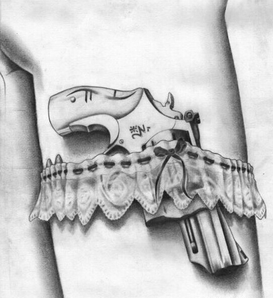 美女个性腿部蕾丝手枪纹身图案图片