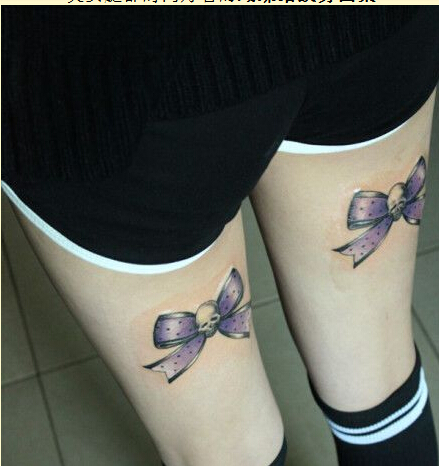 时尚美女腿部好看的蝴蝶结纹身图案图片