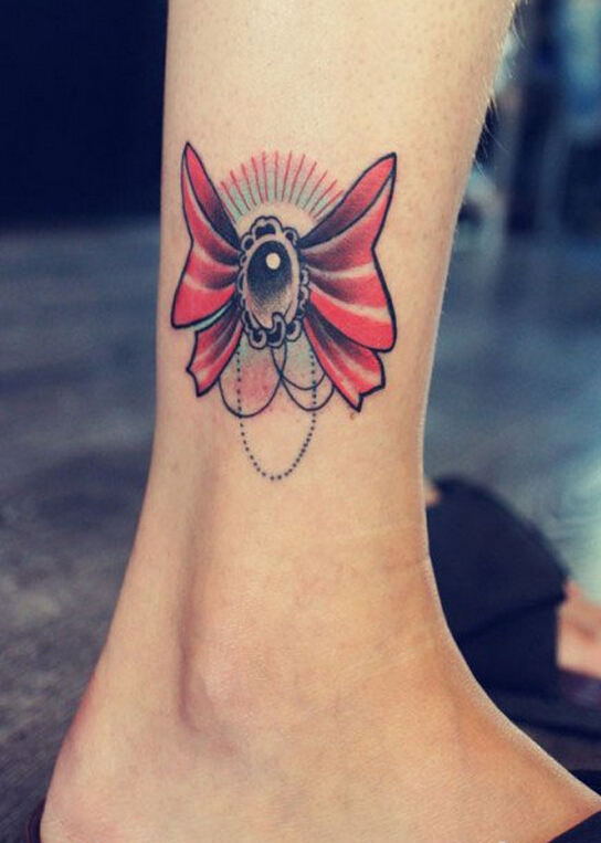 个性女性腿部漂亮的蝴蝶结纹身图案图片