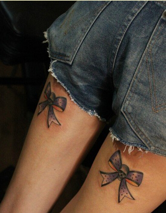 女性腿部个性时尚好看的蝴蝶结纹身图图片