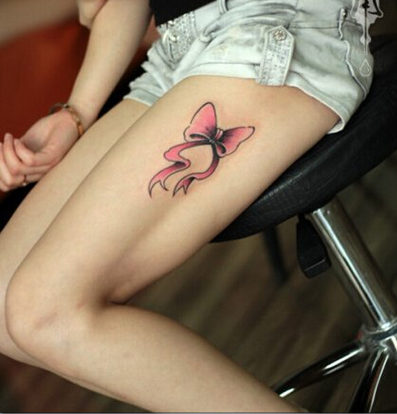 女性腿部唯美好看的彩色蝴蝶结纹身图图片