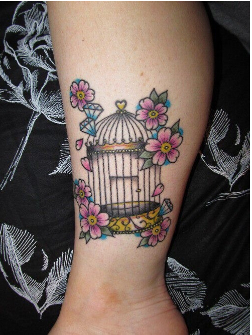 小腿上部漂亮好看的鸟笼花朵纹身图案图片