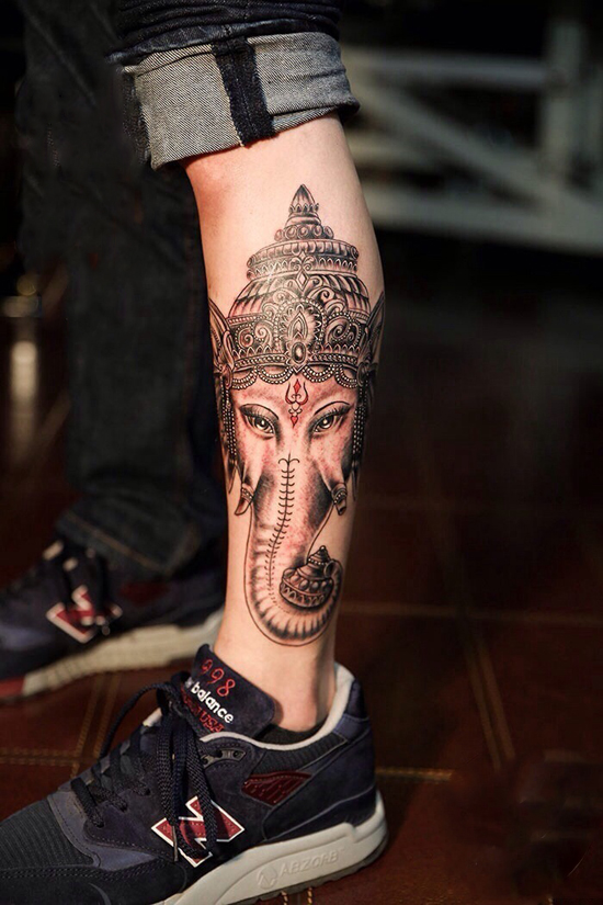 创意复古象神小腿纹身图片