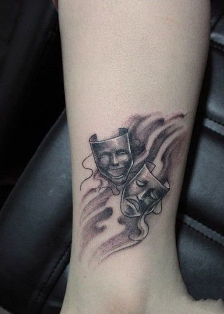 脚踝处另类面具纹身图案图片