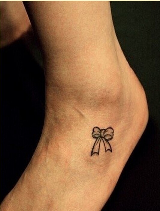 个性腿面漂亮蝴蝶结纹身图案图片