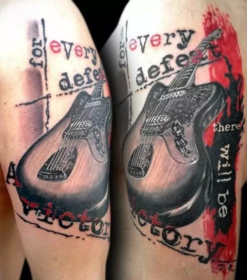 时尚大臂吉他纹身