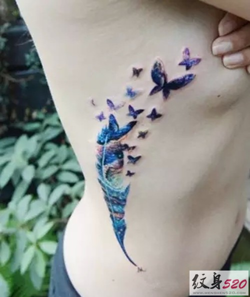 侧腰梦幻的羽化燕纹身