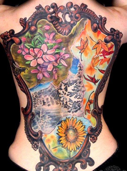 漂亮的满背镜子里的世界纹身图案