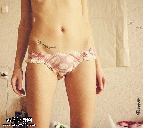 腹部五角星字母纹身图案