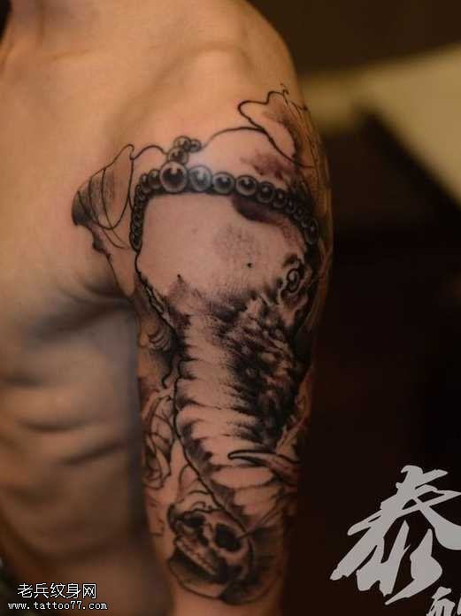 胳膊象财神骷髅纹身图案