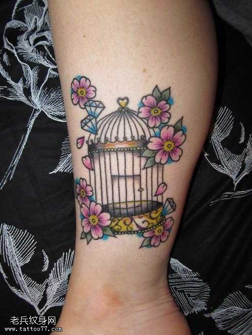腿部好看的鸟笼花朵纹身图案