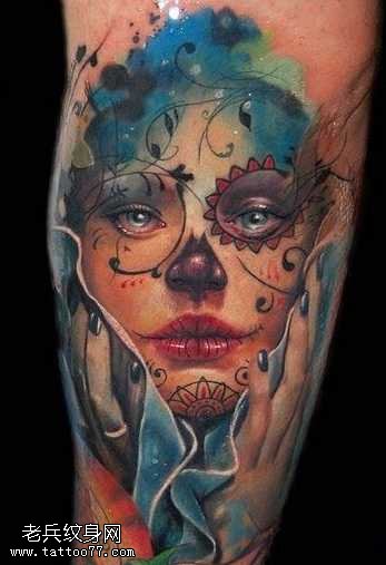 腿部头像纹身图案
