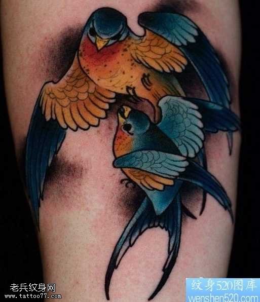 胳膊双飞燕纹身图案