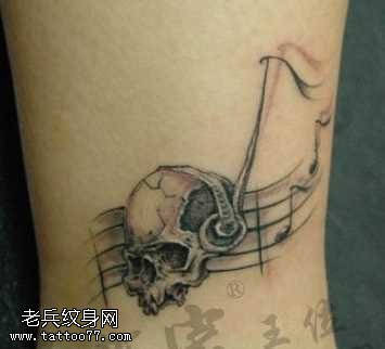 腿部骷髅音符纹身图案