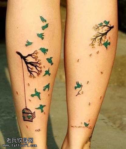 腿部图腾树小鸟纹身图案
