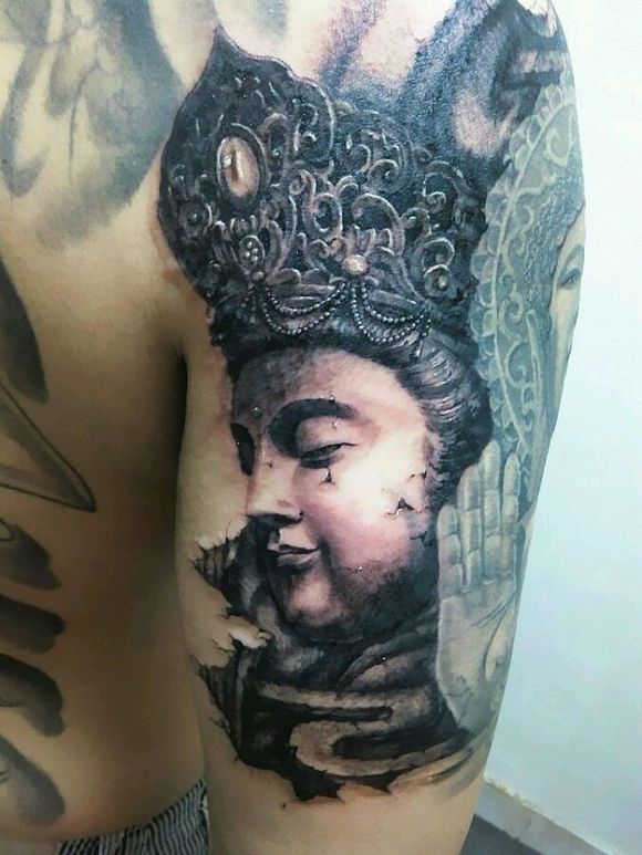 大臂佛头纹身图案