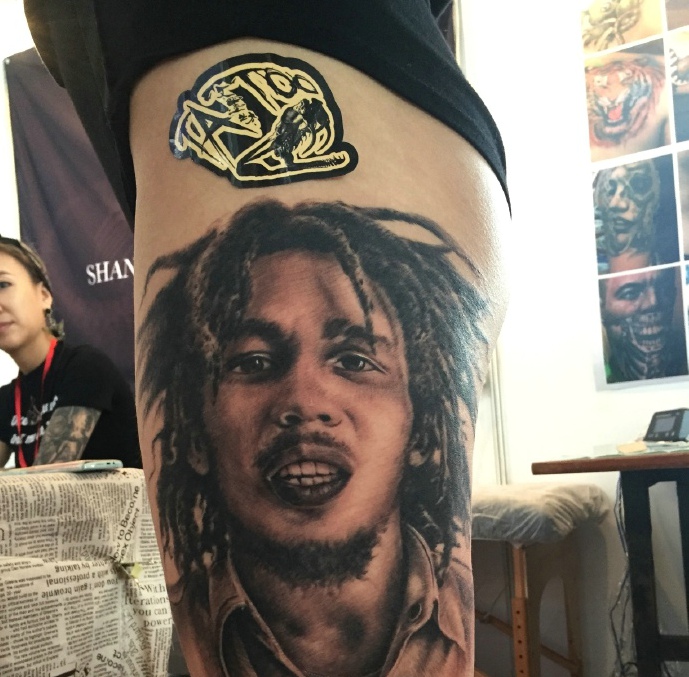 风格不一的两款不同图案刺青