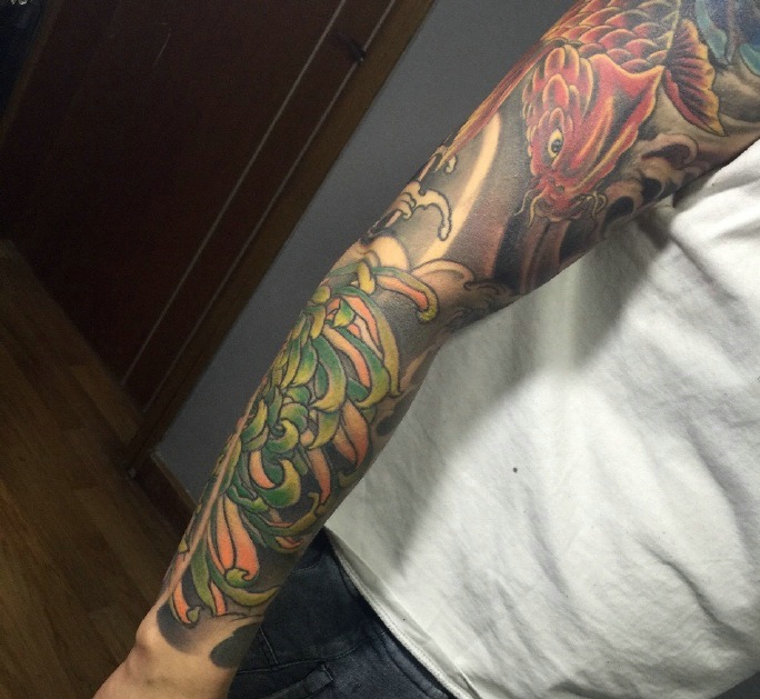 花臂鲤鱼纹身图案财运连连