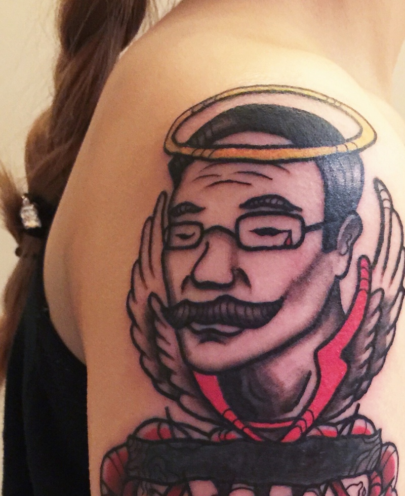 大臂彩色肖像纹身图片创意十足