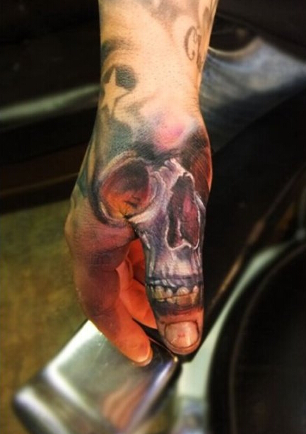 色彩艳丽邪恶骷髅头纹身图案