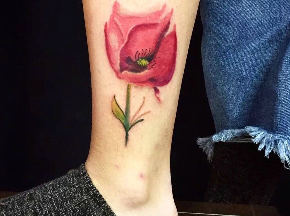 小腿外侧一朵漂亮花朵纹身图片