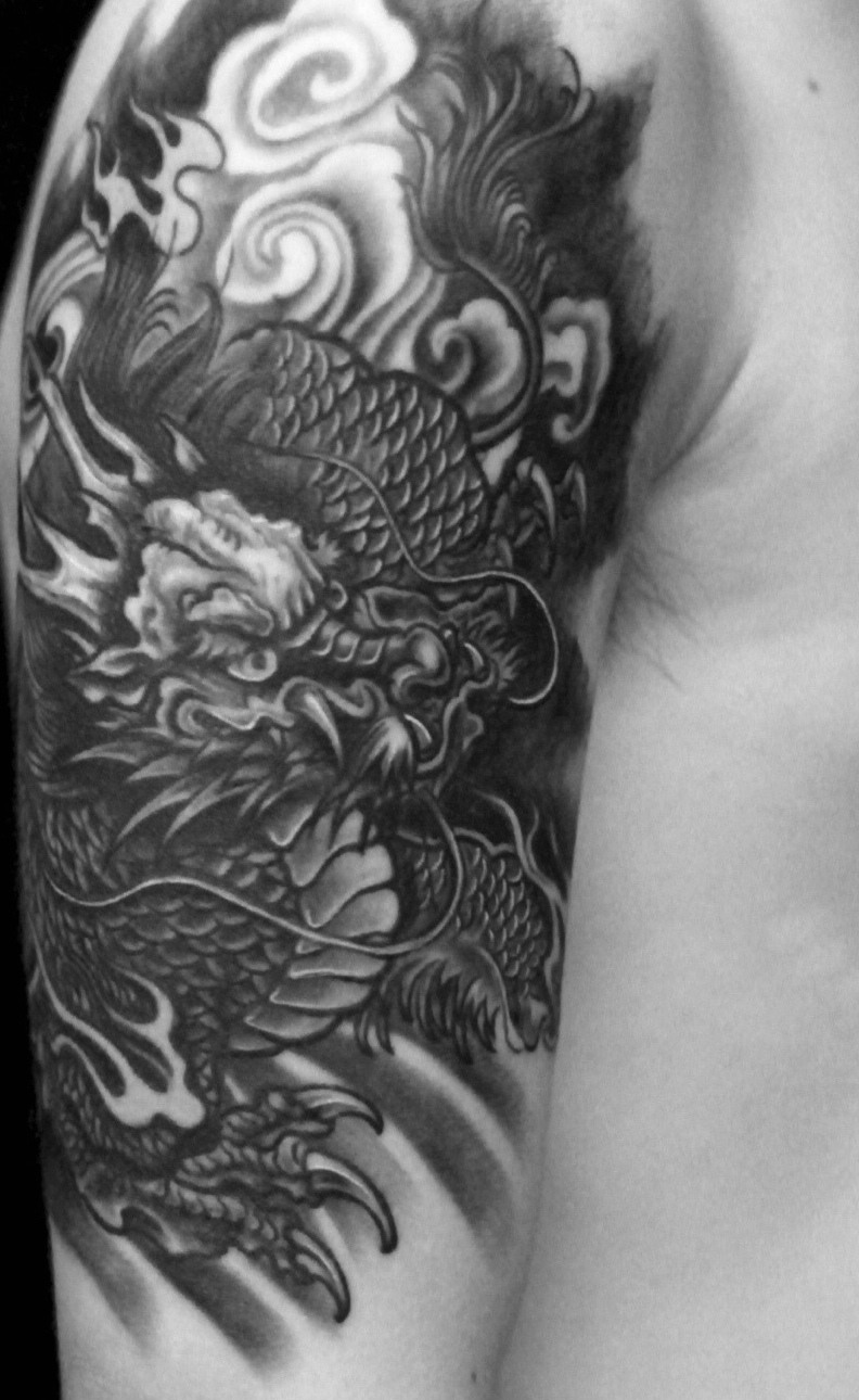 经典老传统黑白麒麟纹身图片