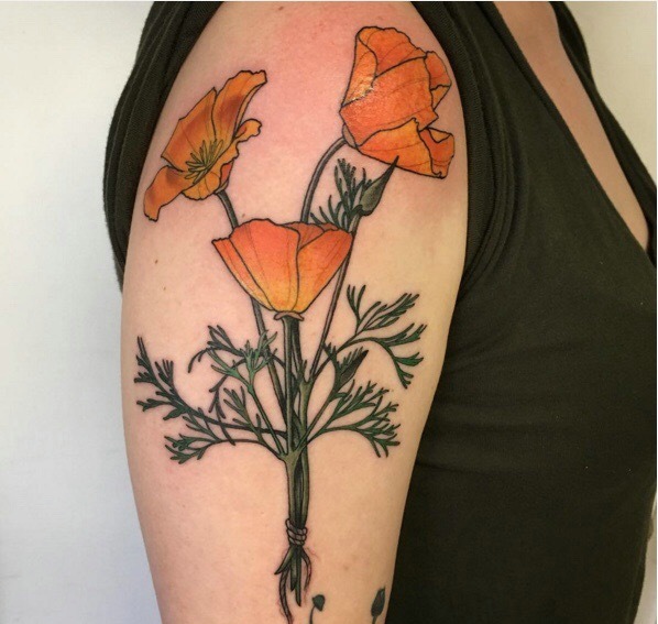 让人陶醉的几款漂亮花朵纹身图片