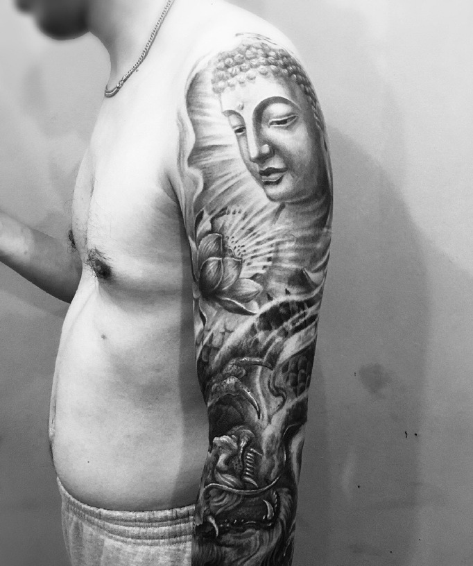 黑白手臂如来佛纹身图片很个性