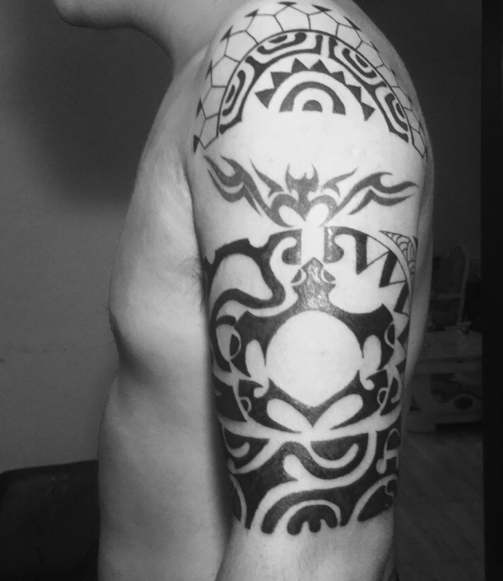 个性豪迈的大臂经典纹身图案