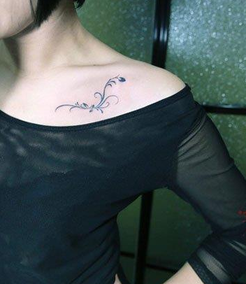 靓女锁骨处乖巧是的图腾藤蔓纹身图案