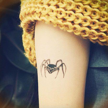 手臂四眼蜘蛛纹身