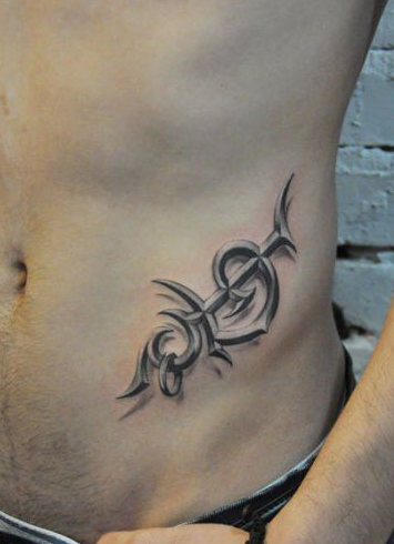 男生腹部漂亮的立体图腾纹身图案