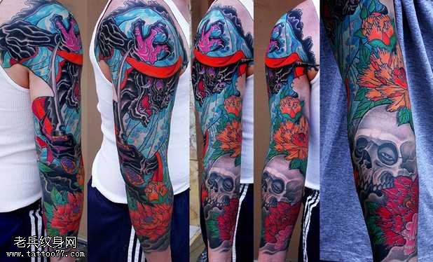 胳膊骷髅玫瑰纹身图案