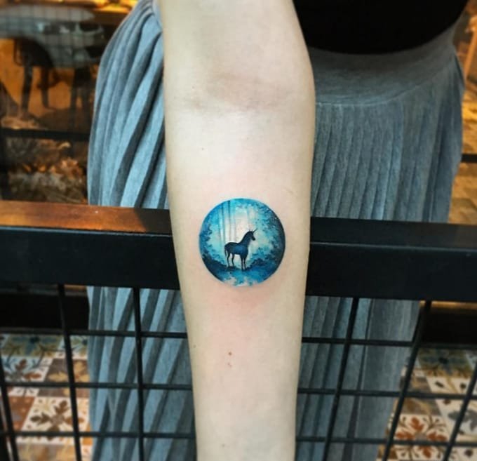 18款手臂上各种美妙的小圆形风景纹身图案