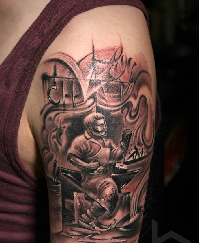 大臂经典十足的图腾纹身图案