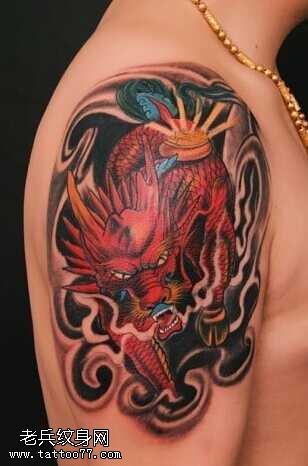胳膊火麒麟霸气纹身图案