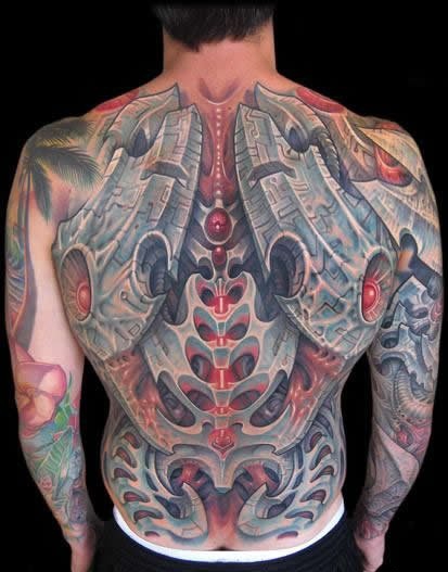 很夸张的恐怖的花腿生物机械纹身图案