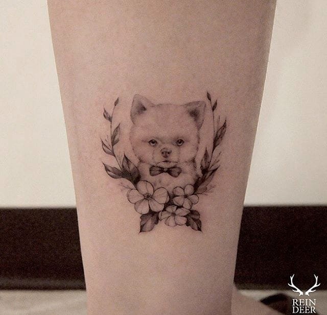 肚子上的细线植物和山羊纹身图案